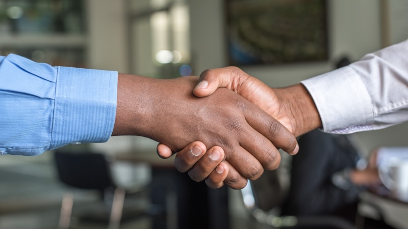 Two finance team members checking supplier payment authorisation controls