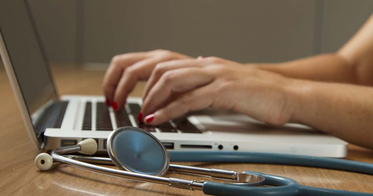 Medical practice team reviewing healthcare payment fraud risks before approving supplier payments